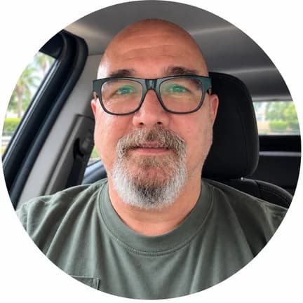 Manuel P. wearing his glasses with anti-reflective lenses