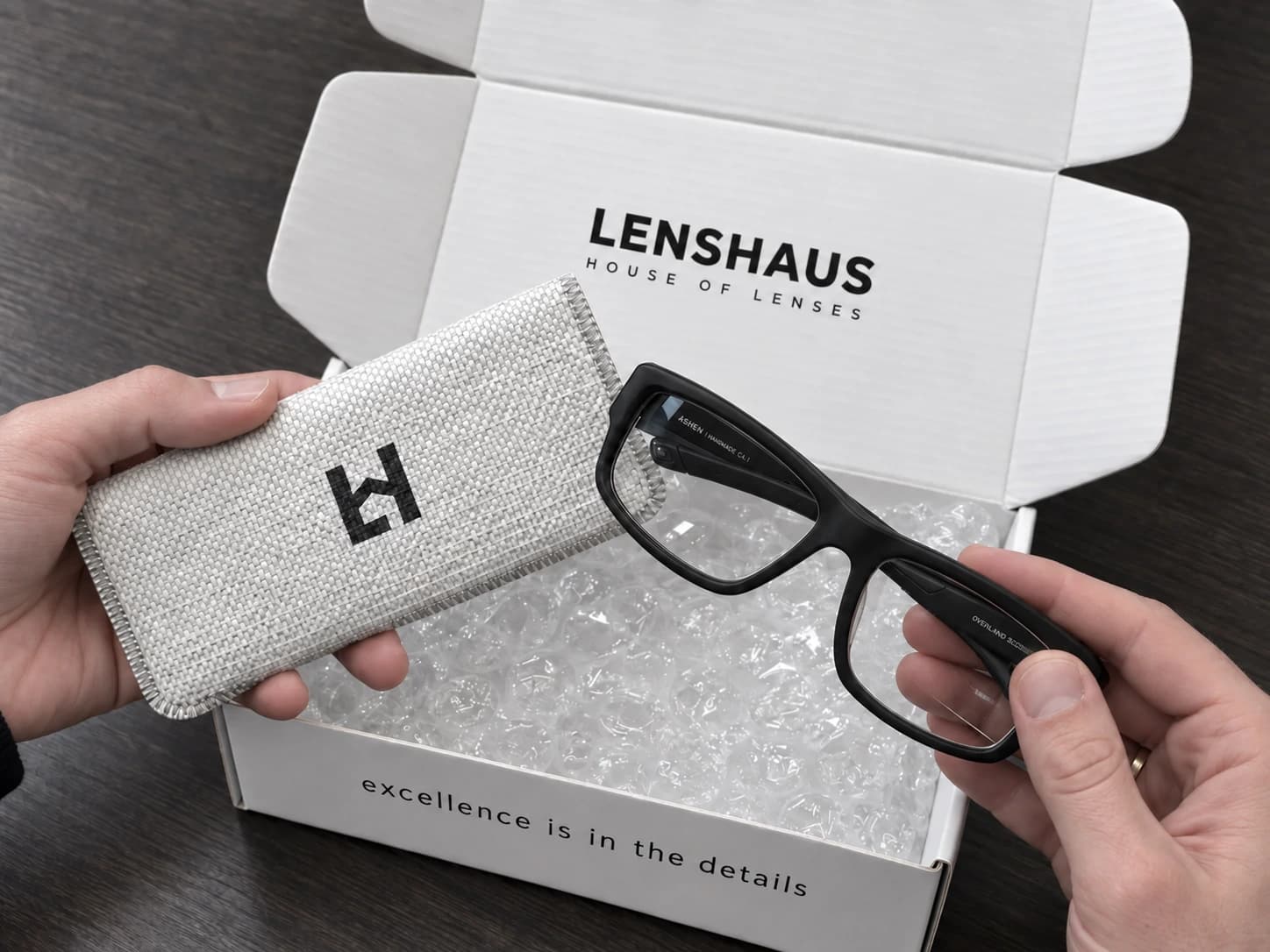 Glasses being packed into a protective Lenshaus mailer